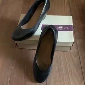 Clarks women’s wedge heel, size 11.